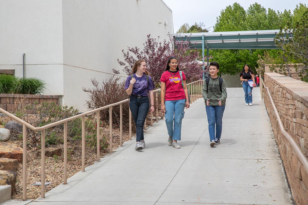 Students Walking by the SJC Clock Tower